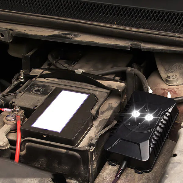 Ultrasonic rodent repeller installed in a car engine bay